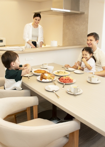 Family enjoying in-room dining