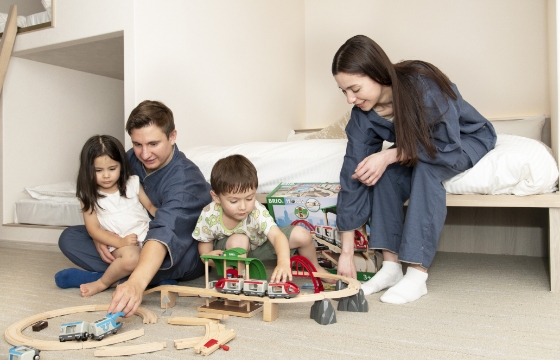 Family playing together in the living room