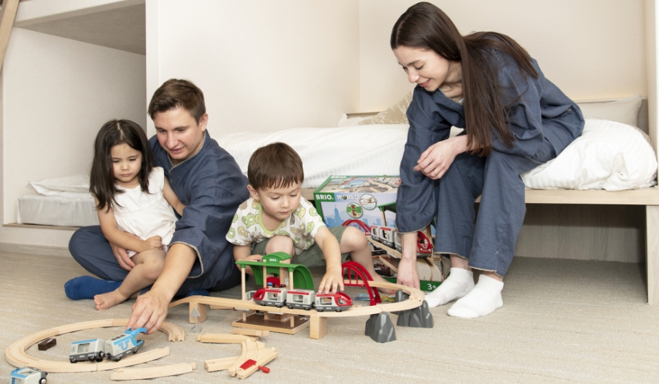 Family playing together in the living room